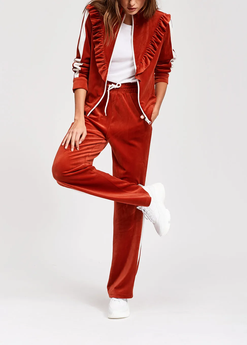 Brick red velvet track jacket with ruffles