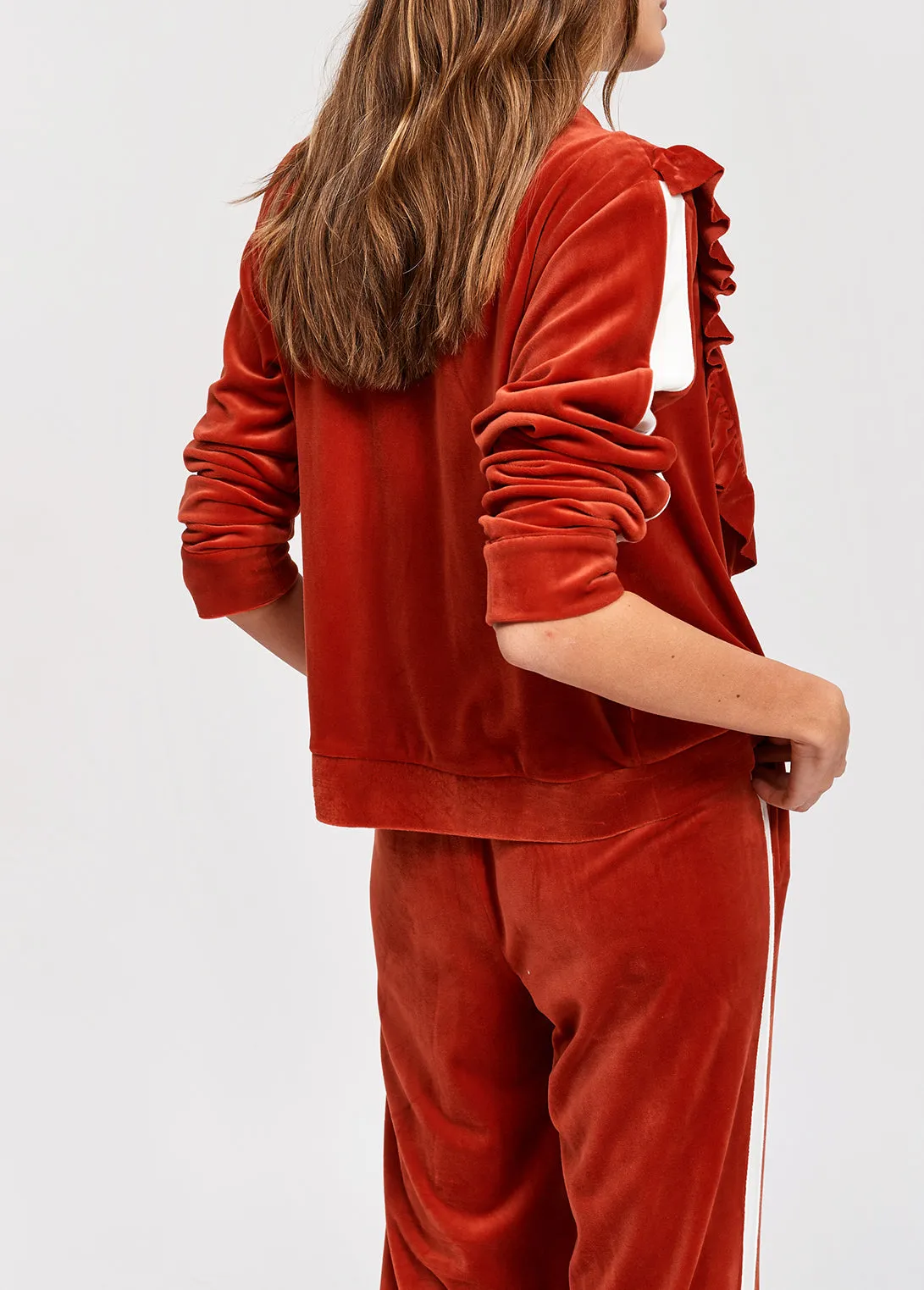 Brick red velvet track jacket with ruffles